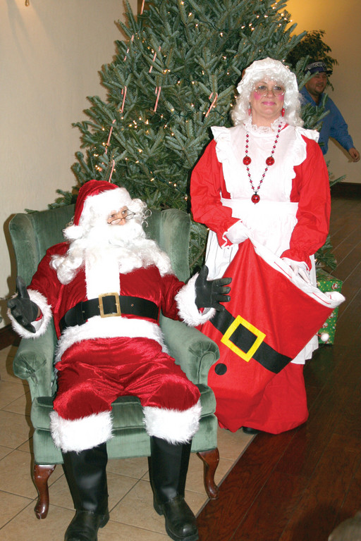 LOOK WHO CAME TO DINNER: Santa and Mrs. Claus are special guests at the Macaroni Dinner each year.