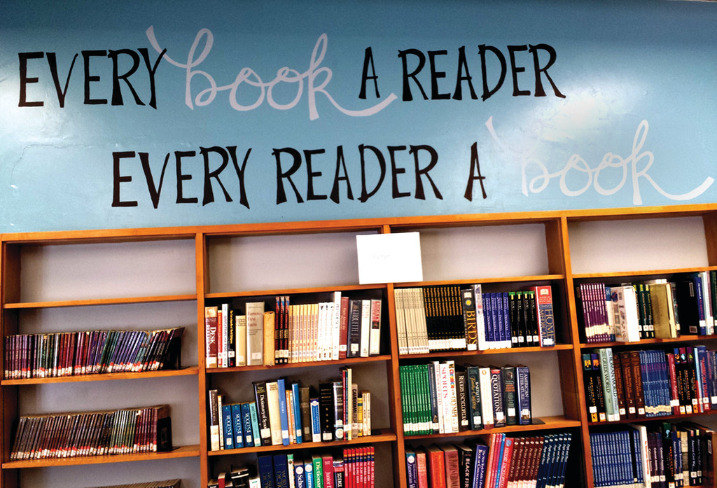 MORE THAN A MURAL: The statement found on the walls of the Park View Middle School library – “Every book a reader, every reader a book” – represents Stephanie Mills’ mission.