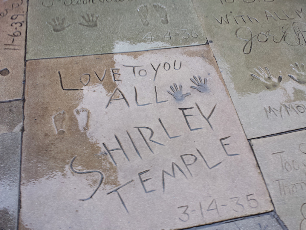 A PART OF HISTORY: Seeing Shirley Temple’s autograph dating back to the 1930s was just one of the famous names we saw as we walked through the various names and dates on the sidewalk in front of the TCL Chinese Theater.