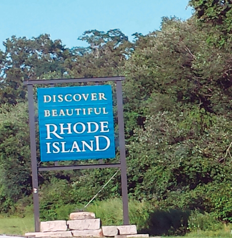 NEVER LOOKED SO GOOD: Our kids couldn’t even recall what the Rhode Island welcoming sign looked like before this trip. Now, I don’t think they’ll ever forget it. By the time we reached the R.I. border, we couldn’t wait to be home.