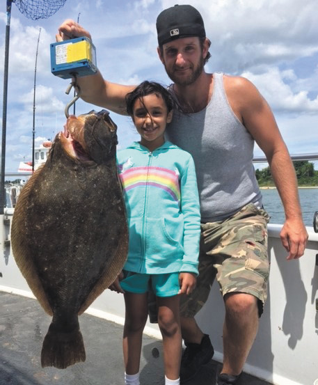 Eight-year-old Tatiana Trouge from Ansonia, CT with the 30 inch, 9.5 pound fluke she caught this past Friday morning using a whole squid bait on the Frances Fleet.