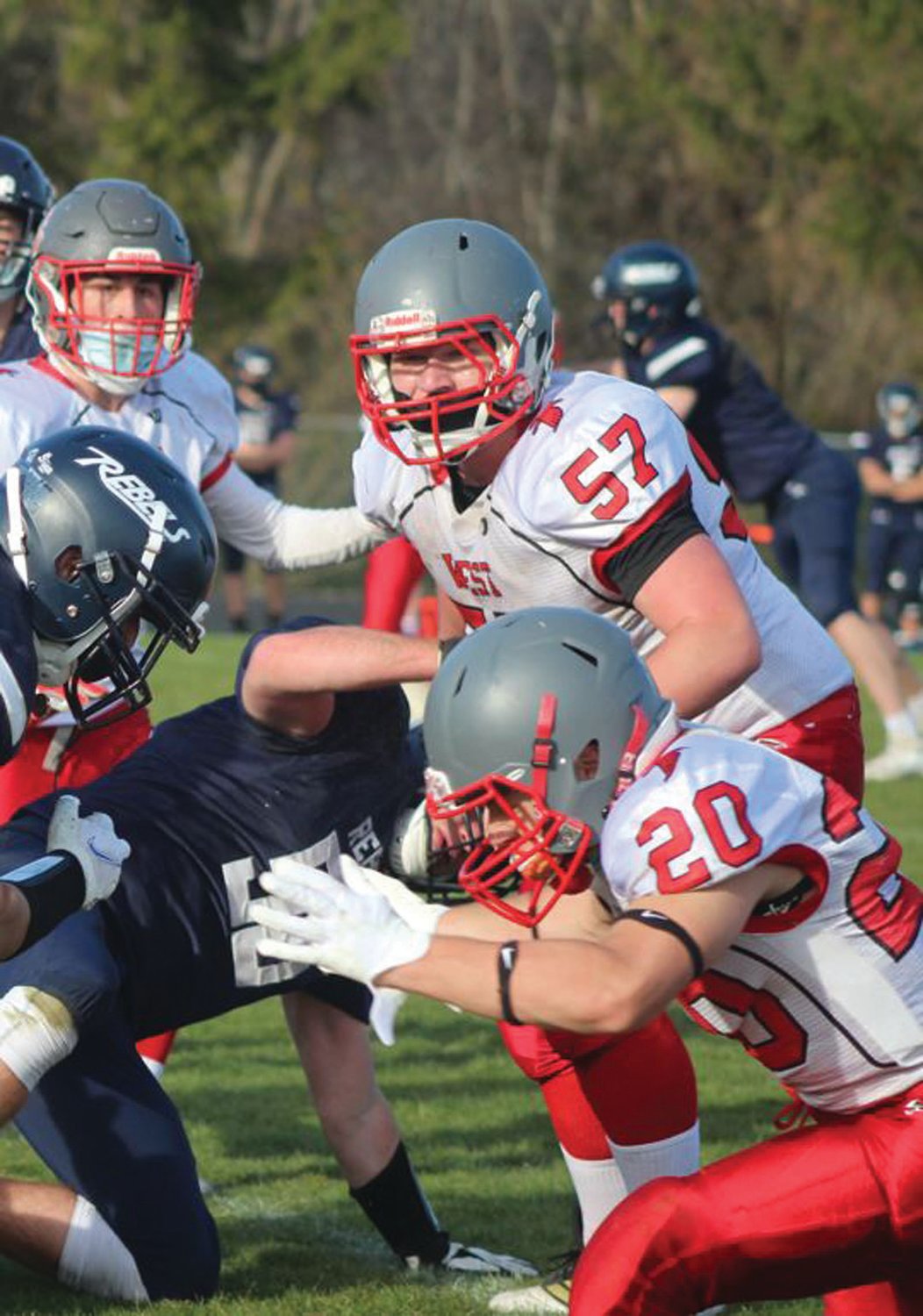 READY TO ROLL: Cranston West’s Rory Perrino (57) closes in on a tackle last spring.