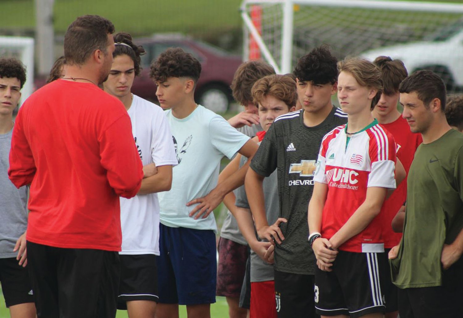 GETTING STARTED: The Cranston West boys soccer team gathers prior to a recent practice to talk strategy. The Falcons are coming off a first-place season in which they made the playoffs, and are looking to take the next step toward a title with their experienced core.