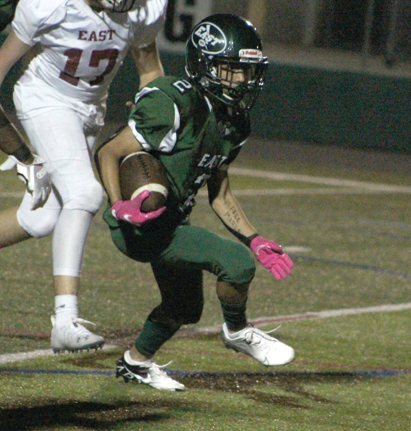 UP THE FIELD: Cranston East’s Romeo Cordero
picks up some yards.