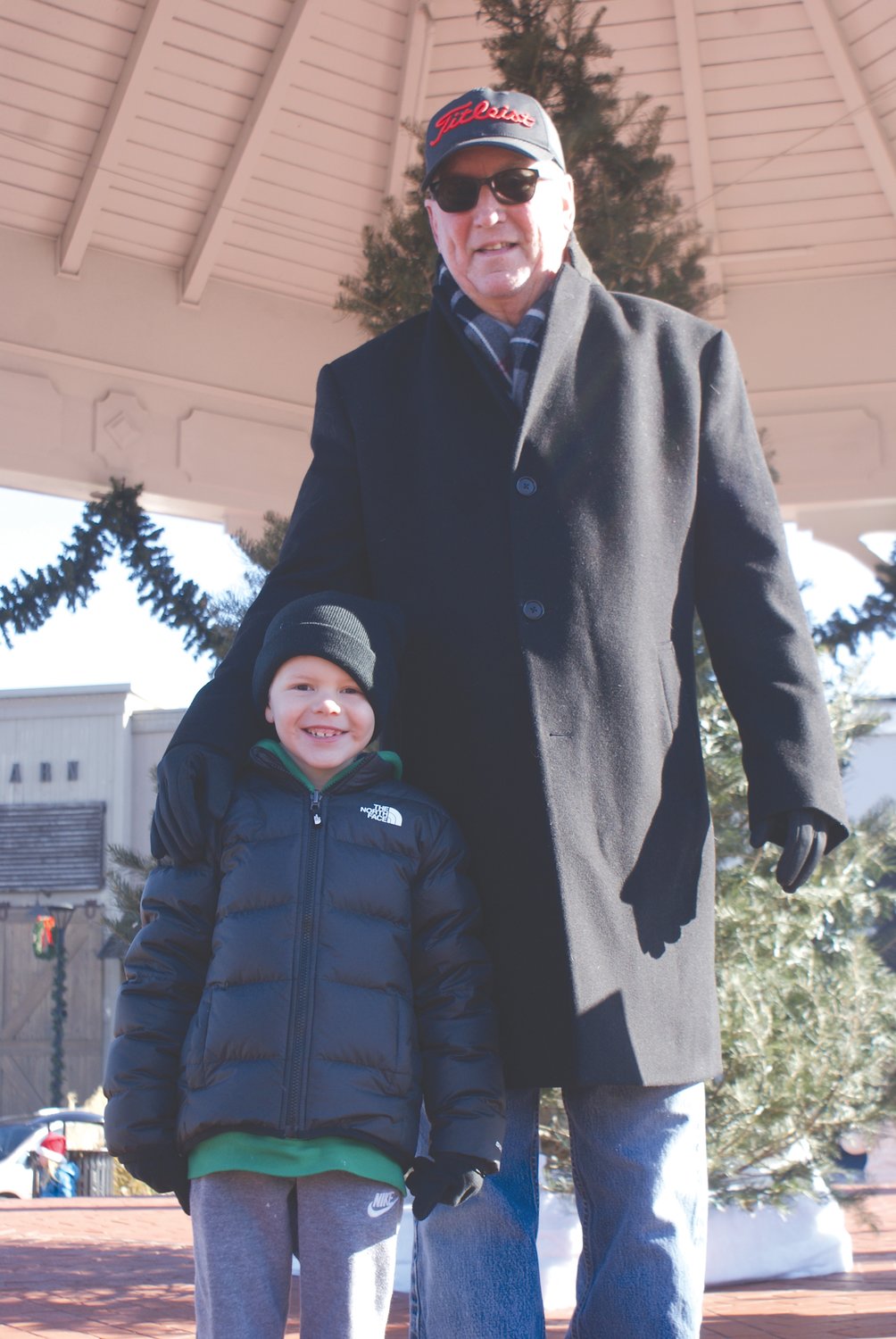 MAYOR HOPKINS BRINGS GREETINGS: Mayor Ken Hopkins brought greetings from the City along with his grandson, JJ Ortega, during Santa’s Grand Entrance in Garden City Center. He wanted to remind everyone that the City Hall Christmas Tree Lighting will be held on Dec. 6 at 5 p.m.