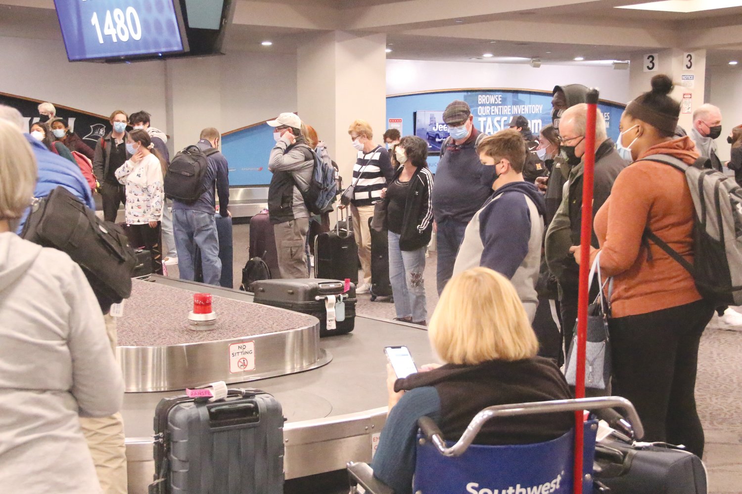 NOT MUCH OF A WAIT: Thanksgiving Day travelers returning to Green Airport Sunday didn’t wait long to get their baggage on an afternoon flight from Baltimore.