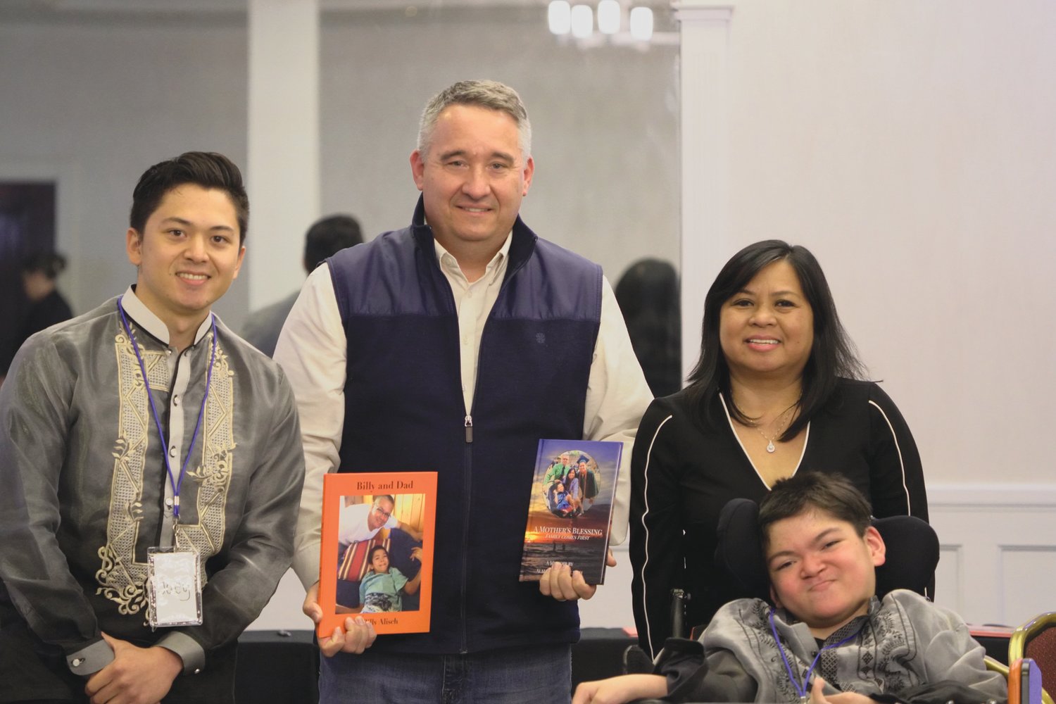 AT BOOK SIGNING: From left Joseph Steven Ritualo Alisch, Ward 3 Councilman Tim Howe, Alma Ritualo Alisch and William Mackenzie Alisch are pictured at the book signing held Nov. 6 .