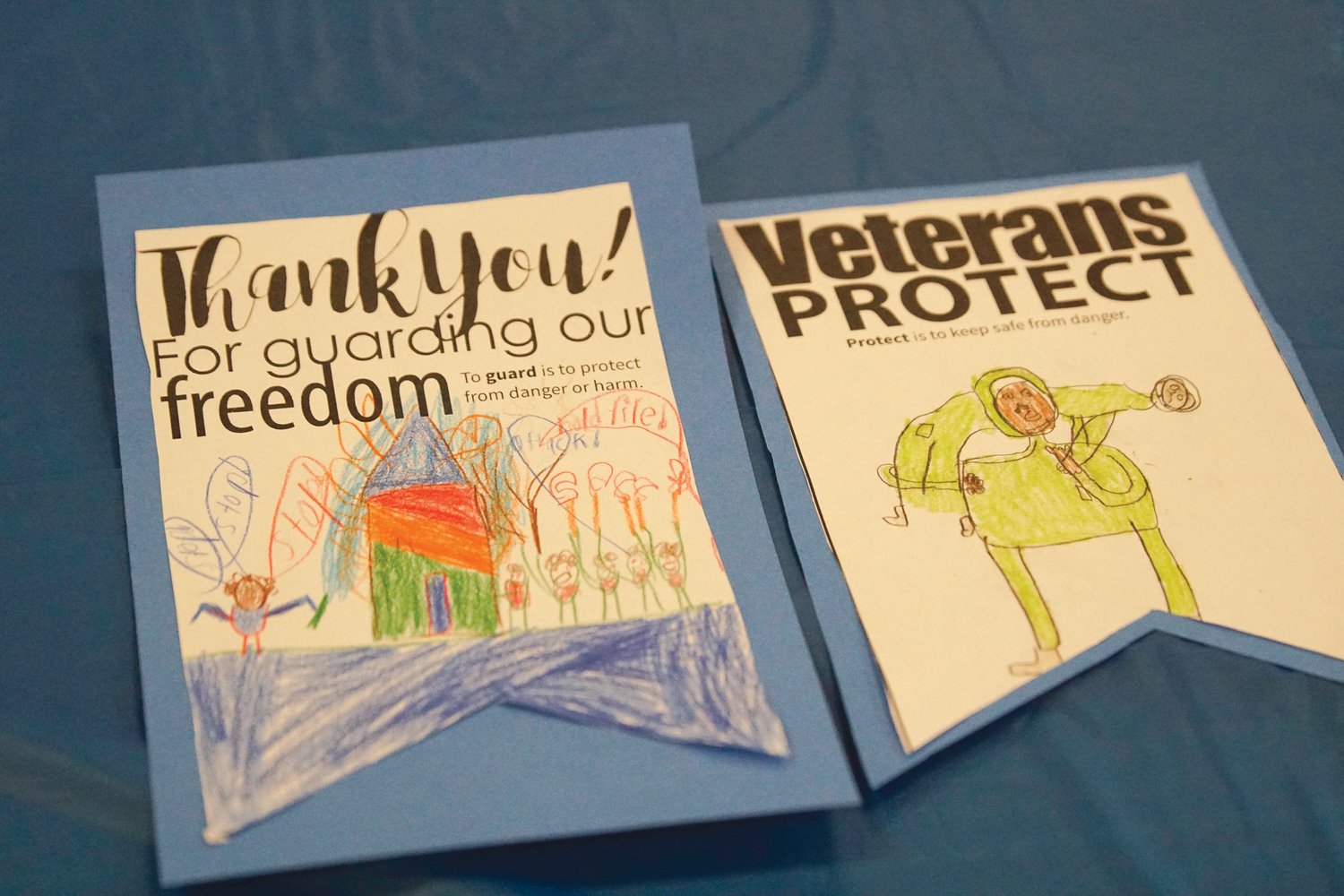 ART OF SAYING THANKS: Artwork created by students
to celebrate veterans, the school's honored guests, was
placed on tables for all to enjoy during Glen Hills Elementary
School's Veterans Day Celebration.