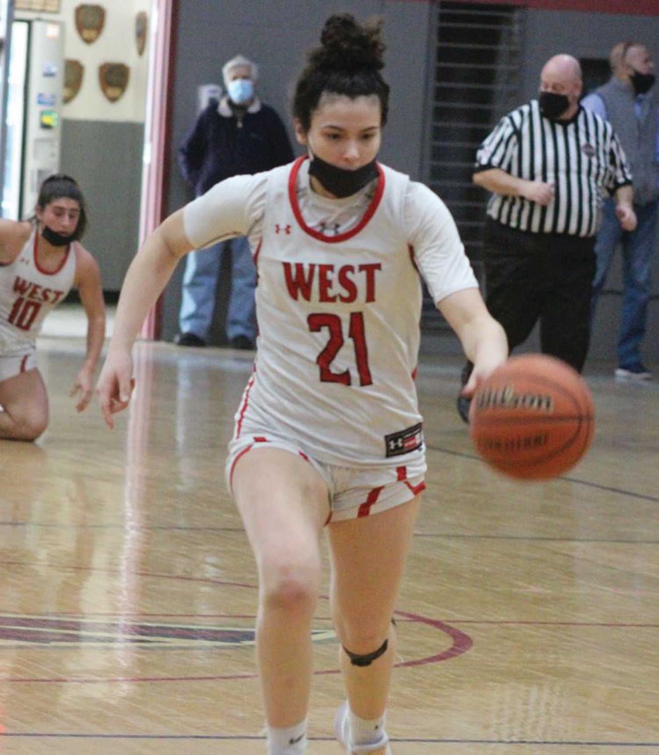 UP THE COURT: West’s Catherine Albizu dribbles the ball up the court.