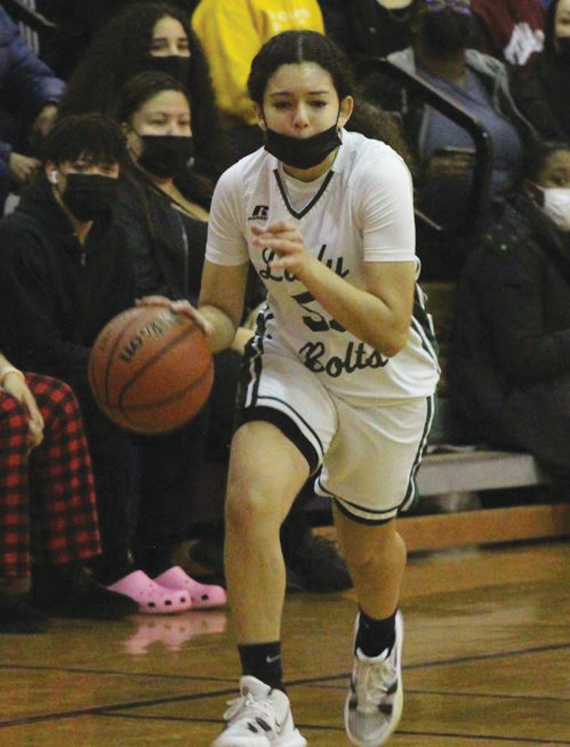 PLAYOFF HOOPS:
Cranston East’s Bella
Dupret dribbles the ball up
the court against Juanita
Sanchez on Monday night
in Providence. The secondseeded
Cavs dealt East a
54-27 defeat and will move
on to the semifinals.