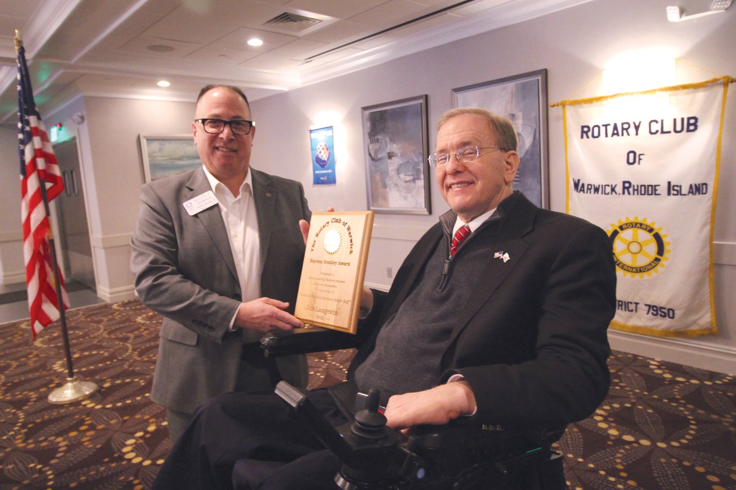 IN RECOGNITION OF SERVICE: Warwick Rotary vice president Scott Seaback presents Congressman Langevin with the club’s
Hayden Bentley Award. Named after a founding member of the club, the award is given to a member of the community who personifies
the Rotary motto of “service above self.”