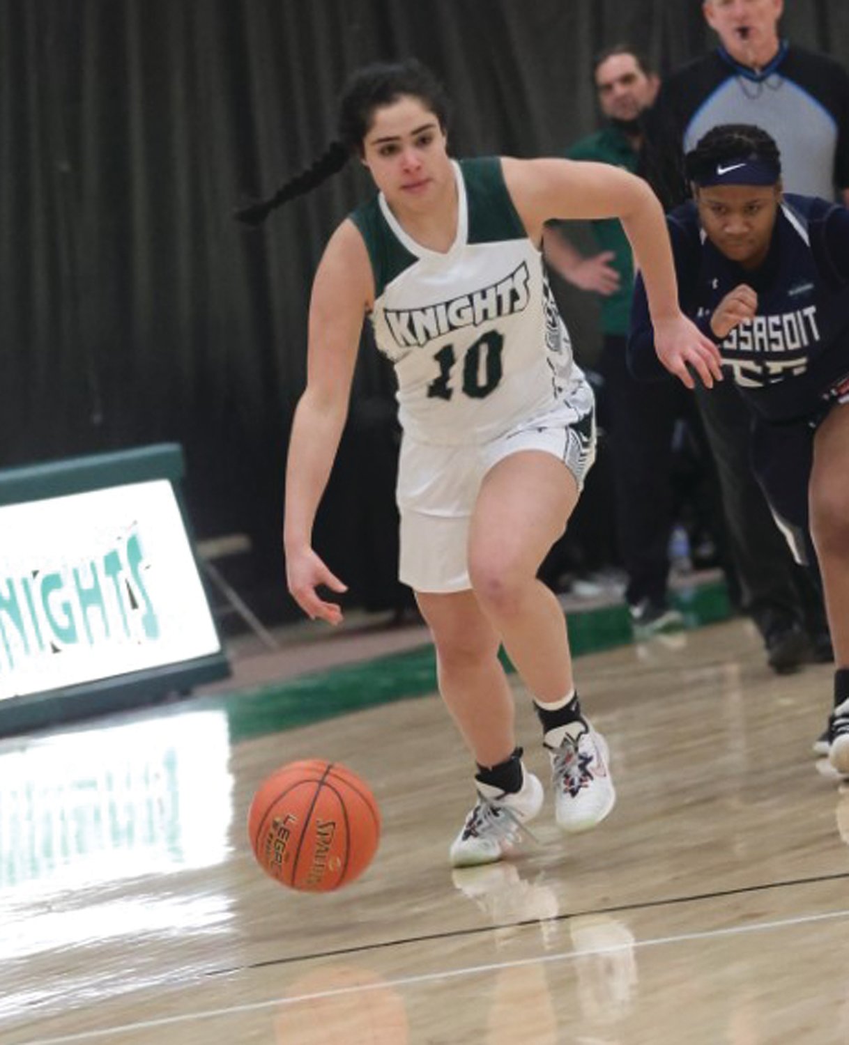 UP THE COURT: Talia Thibodeau dribbles up the court this season.