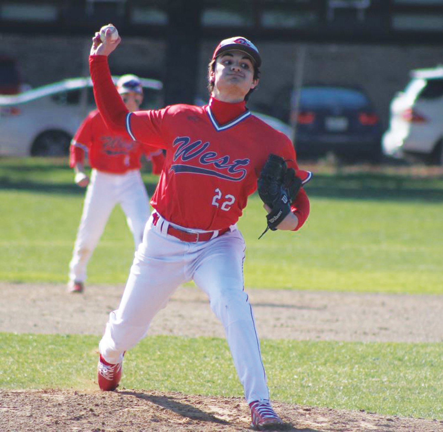ACE: Cranston West starting pitcher Luciano Leone delivers a pitch on Monday afternoon against Pilgrim High School during the team’s season opener. The Falcons lost 2-0. but Leone had a solid outing by allowing just three hits and two runs across five innings of work while striking out five Pilgrim batters. The Falcons will get a chance for some revenge when they host Pilgrim on Thursday. (Photos