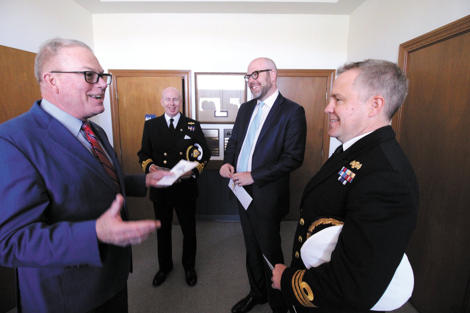 THE REDCOATS HAVE ARRIVED: Rep. Joseph M. McNamara chats with British Naval Commander Steven White, Great Britain’s Consul General for New England Dr. Peter Abbott OBE, and Commander Simon Rogers, of Her Majesty’s Royal Navy.