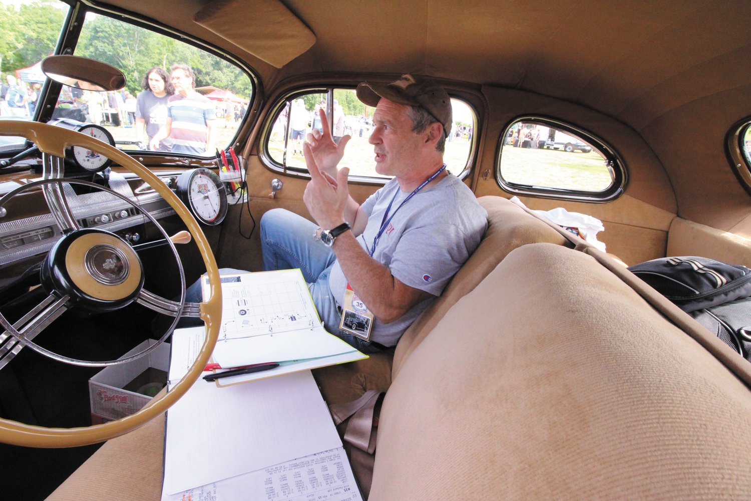 MAKING CALCULATIONS: 
AJ SanClemente is the navigator for the 1939 Model 120
Packard
driven by 
Tom Laferriere.