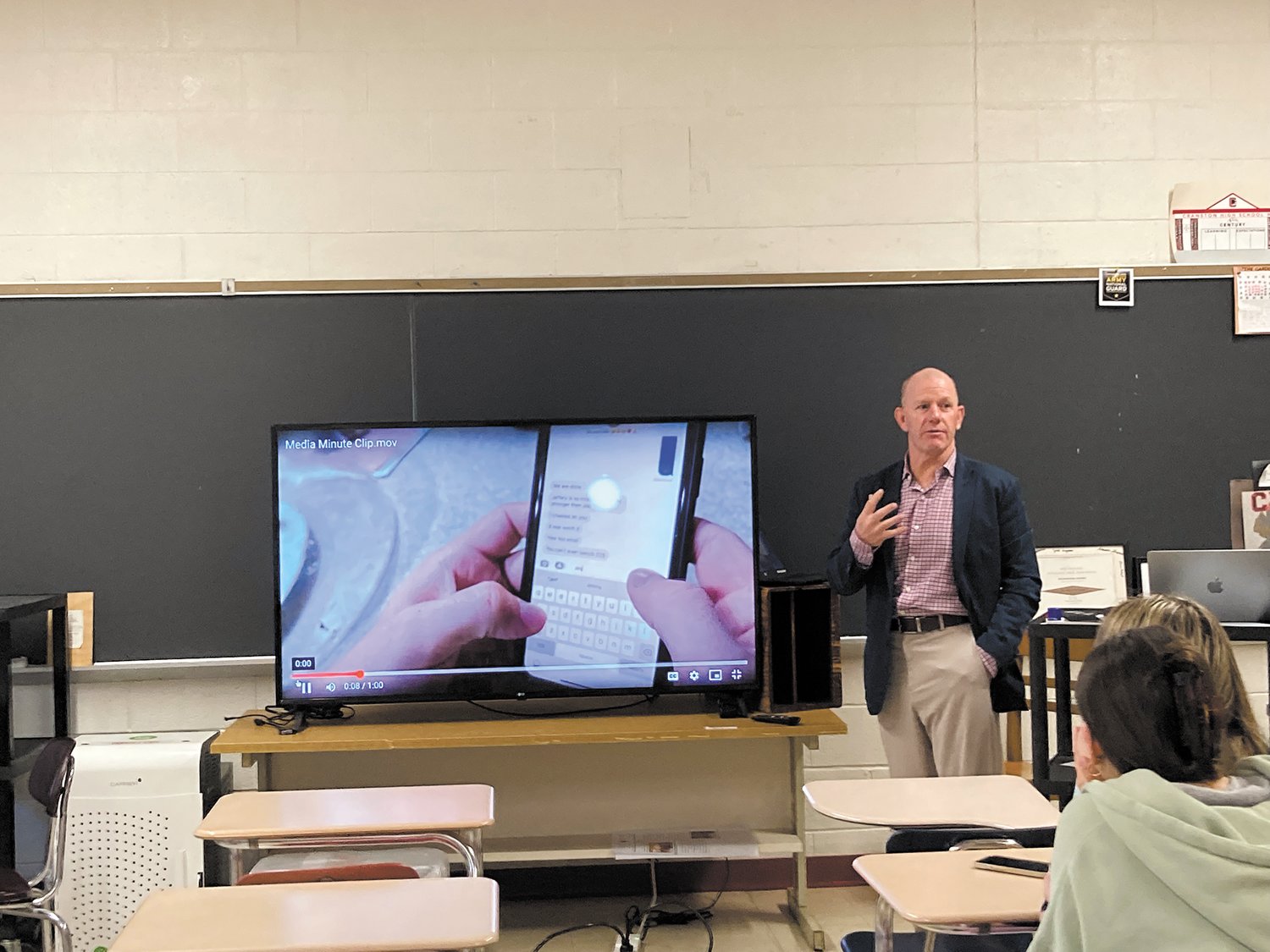 SHARING WITH THE CLASS: Jones had students produce a one-minute narrative using three a variety of tight, medium and wide camera shot types which were shown and analyzed in class. (Herald photo)
