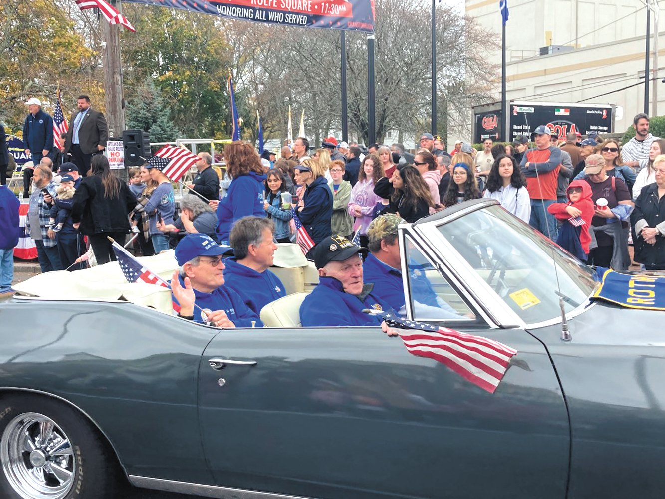 A SALUTE TO VETS: Veterans received rides in antiques cars and military vehicles in last week’s parade.