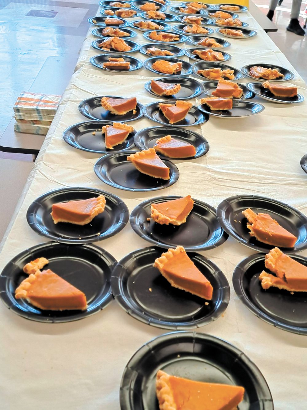 IN THE MOOD FOR PUMPKIN: Food for the Thanksgiving celebration came from a variety of donors. Dig In Dining and Entertainment donated turkeys and dessert and the MLL staff used gift cards to purchase pies from local markets.
