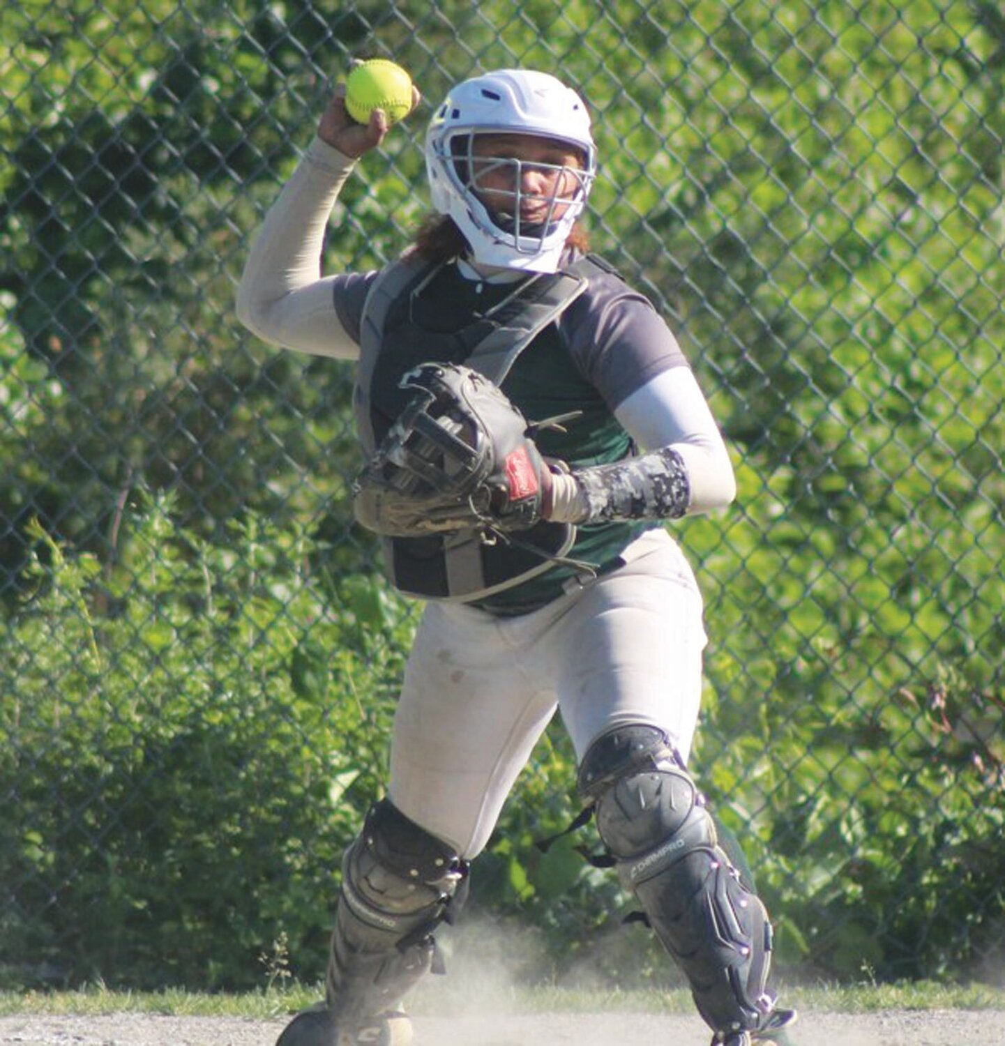 BEHIND THE PLATE: East catcher Jaylanie Rosado makes a play.