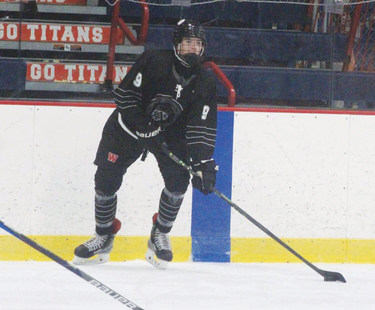 ON THE ICE: Pilgrim’s Richie Cavanagh makes a play in a game last season.